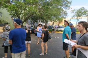 Diane Shelly (blue dress and straw hat in center) leading the tour.