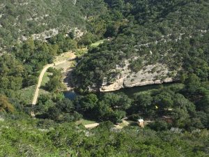 At the top. Look closely and you will see my yellow tent. The "pond" is also visible. I'm told kids jump off the 30 foot cliff into the water. 