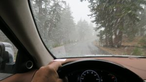 Snow pelting the windshield.